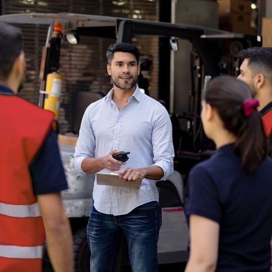 Delivery business owner with their team of employee drivers.